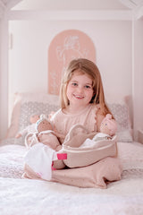Knitted Carry Cot with Rheya Baby Dark Skin, Soother & Blanket